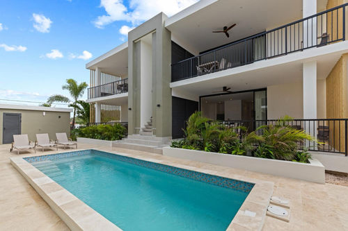 آخرین اخبار شرکت در مورد پروژه ویلاهای کارائیب: بهبود زندگی گرمسیری با فن های سقف چوبی